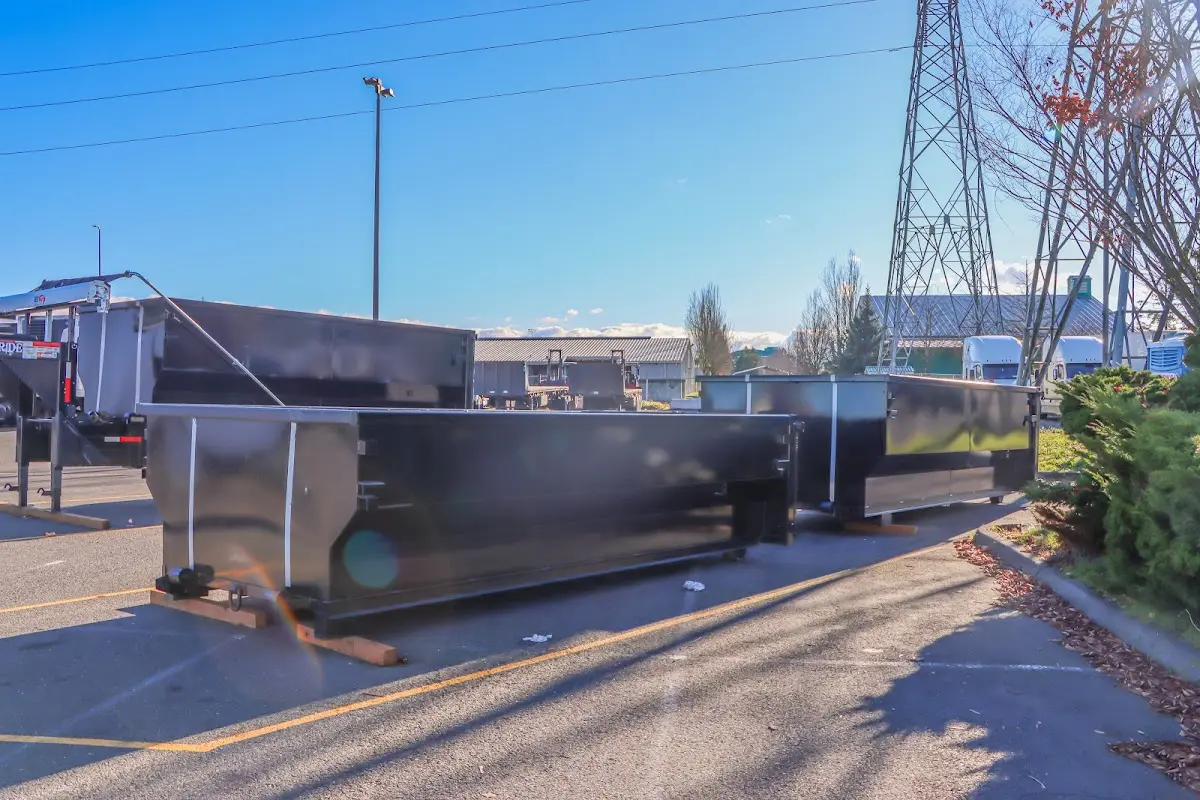 Roll-off dumpster ready for waste disposal at job site for Concrete Dumpster Rental in Eastchester